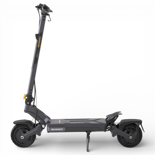 Black electric scooter with folded stand on a white background